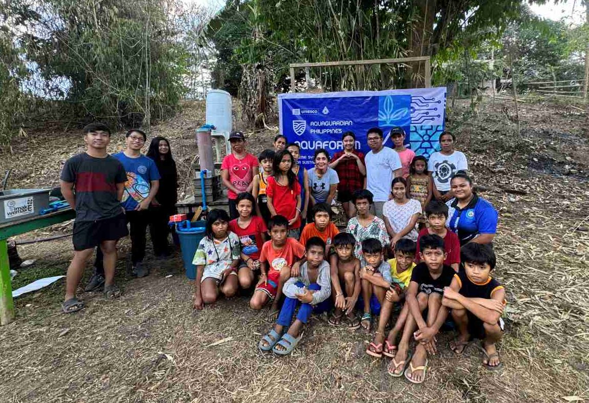 Group photo of the team with the local beneficiaries