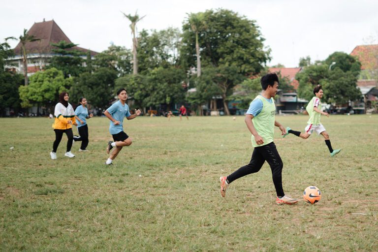 Building Change-Makers by Learning, Coaching, and Community Action